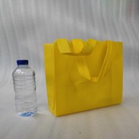 Tas Spunbond Goodie Bag Handle Lipat Samping 75 gsm 25x35x8