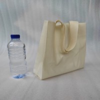 Tas Spunbond Goodie Bag Handle Lipat Samping 75 gsm 25x35x8